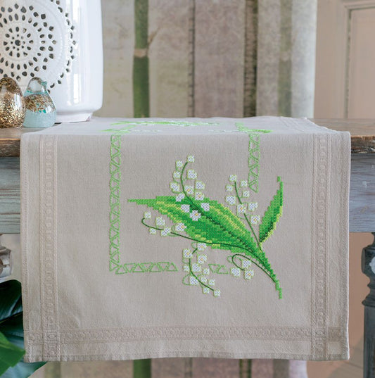 Camino de mesa en punto de cruz con diseño de lirios blancos de Vervaco