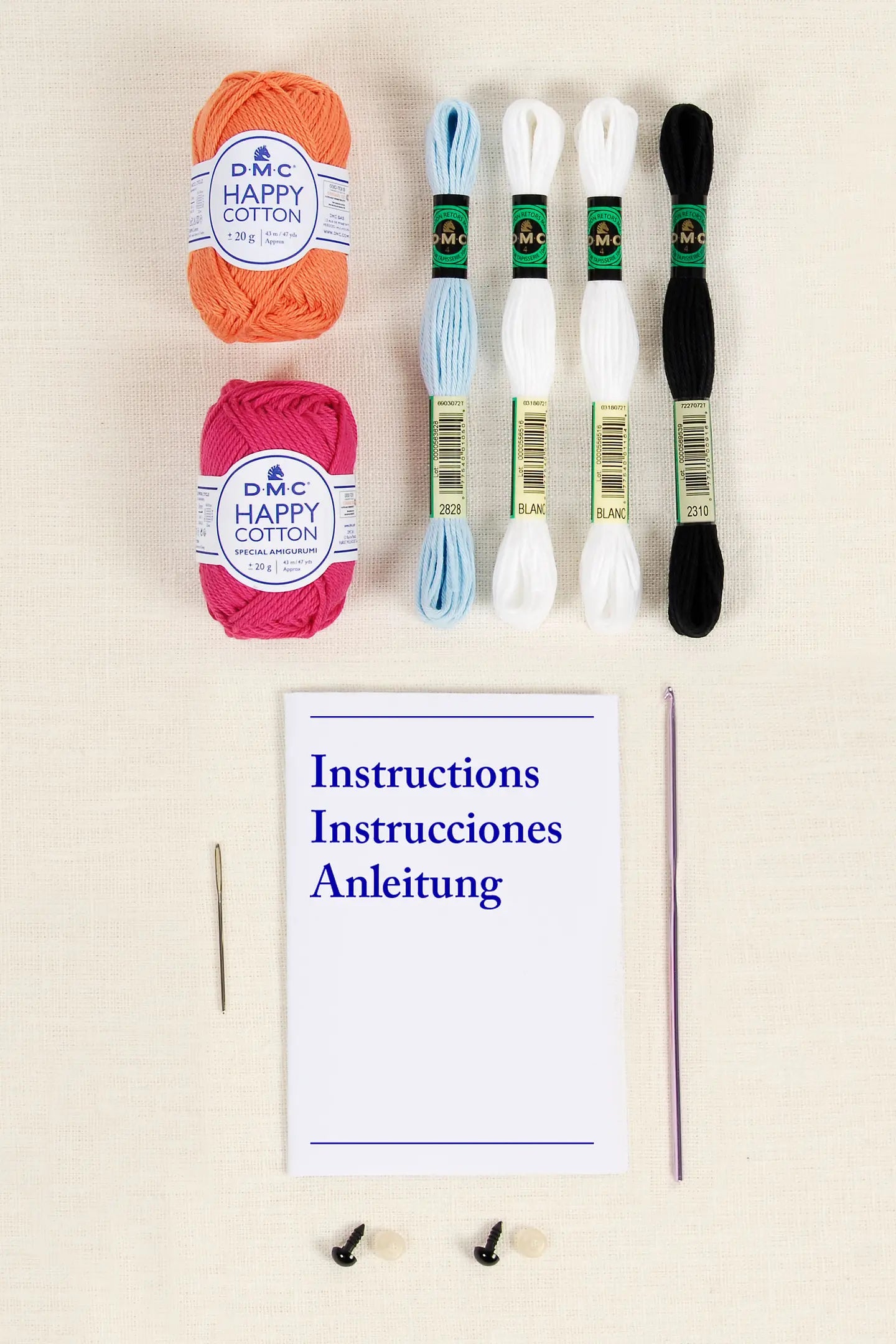 Contenido del kit de amigurumi DMC Pez Payaso con hilos Happy Cotton, Retors Mat, aguja de ganchillo y ojos