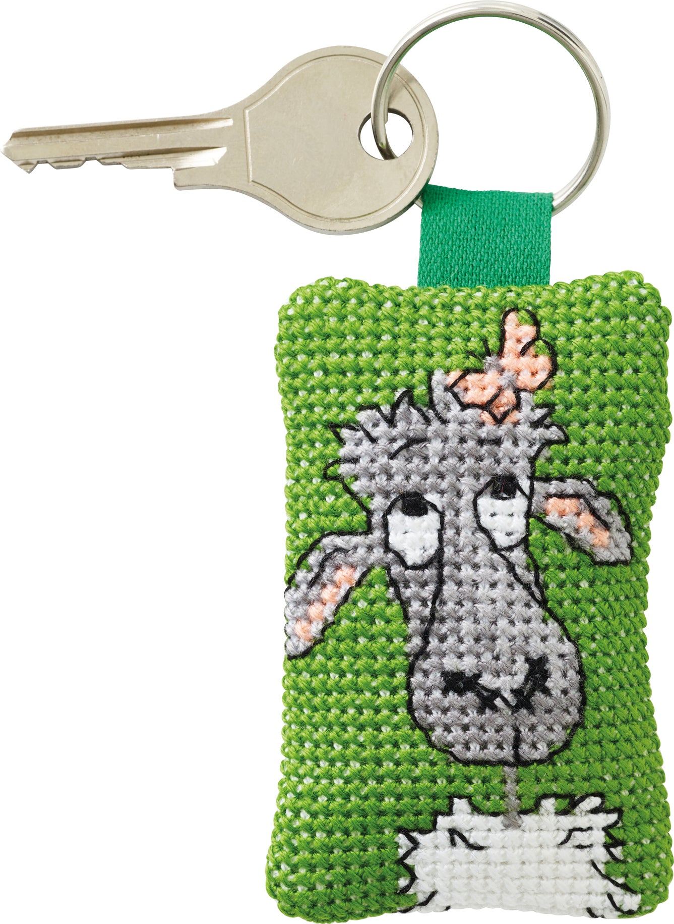 Kit de punto de cruz Permin llavero oveja gris con mariposa rosa sobre fondo verde, incluye tela Aida, hilos, aguja, anilla e instrucciones.