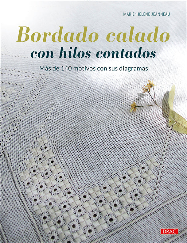 Libro Bordado Calado con Hilos Contados de Marie-Hélène Jeanneau: portada con un mantel de bordado blanco calado sobre lino claro