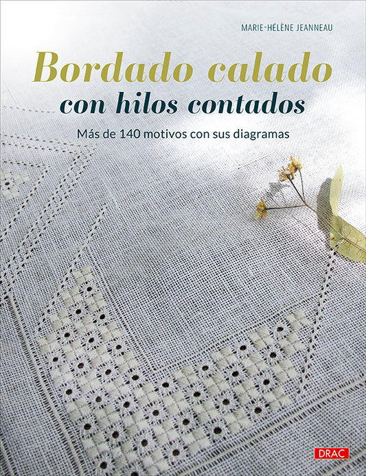 Libro Bordado Calado con Hilos Contados de Marie-Hélène Jeanneau: portada con un mantel de bordado blanco calado sobre lino claro