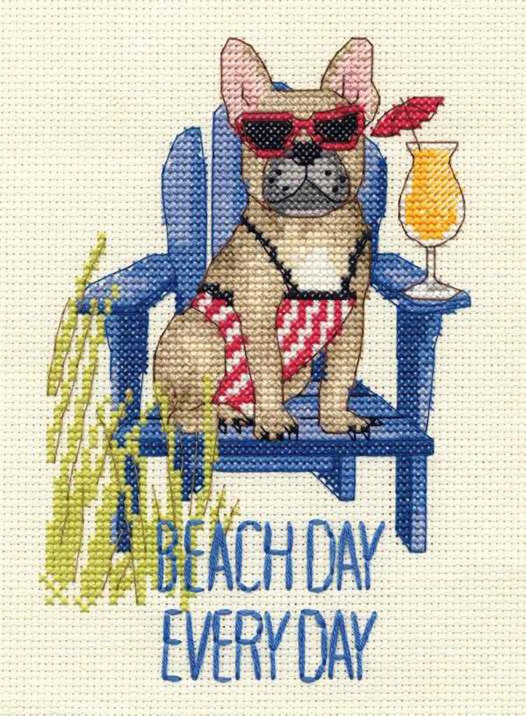 Bordado en punto de cruz de un bulldog francés en la playa con gafas de sol