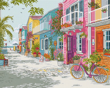 Kit de punto de cruz Letistitch Seaside Harmony con escena de casas costeras coloridas y ambiente marítimo relajante.