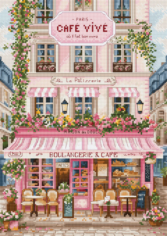 Kit de punto de cruz Letistitch Dulce Calle Parisina con fachada de boulangerie y café parisino, toldos rosas a rayas, flores trepadoras y terraza con mesitas.