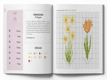 Libro Agenda 2026 Sueños de Flores en Punto de Cruz de Editorial MANGO con 53 gráficos florales, consejos y relatos para bordado y organización creativa.