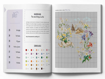 Libro Agenda 2026 Sueños de Flores en Punto de Cruz de Editorial MANGO con 53 gráficos florales, consejos y relatos para bordado y organización creativa.