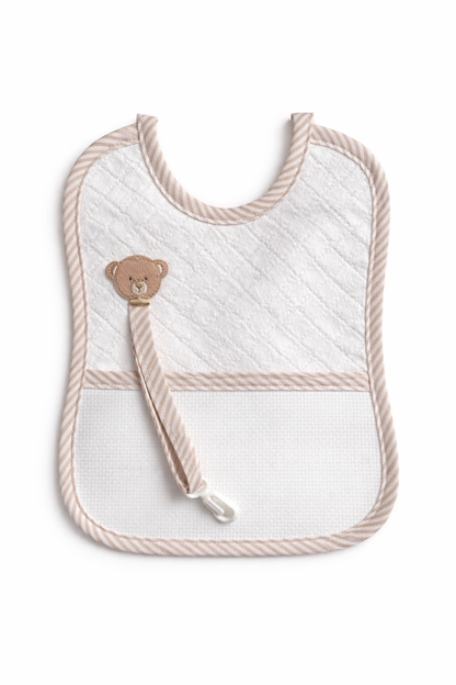 Babero para bordar con porta chupete BM Ricami color beige con osito y tela Aida 14 ct para personalizar en punto de cruz.