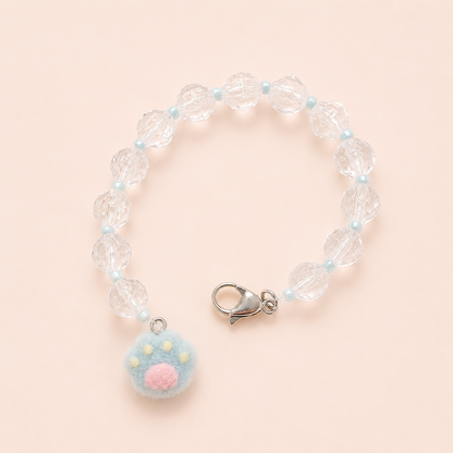 Buscatijeras con abalorios transparentes, cuentas azules y charm de huella de gato azul pastel para tijeras de costura.