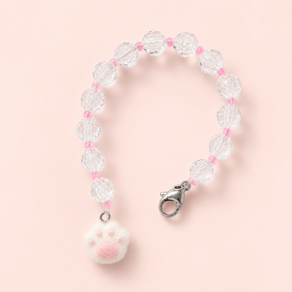 Buscatijeras con abalorios transparentes y charm de huella de gato blanca y rosa para tijeras de bordado.