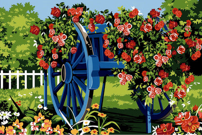 Cañamazo impreso para medio punto La Carretilla Azul de SEG de Paris con carretilla azul rodeada de rosas y flores de jardín.