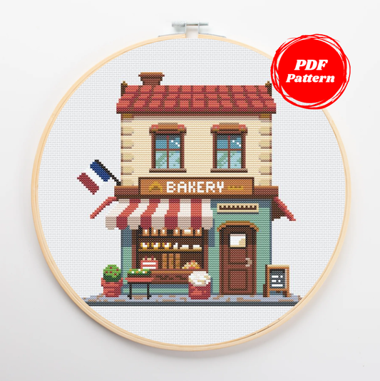 Patrón de punto de cruz de una acogedora panadería francesa con detalles en el expositor