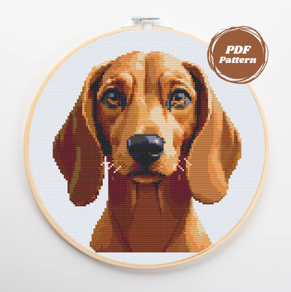 Patrón de punto de cruz de la cara de un Dachshund de pelo corto y color marrón