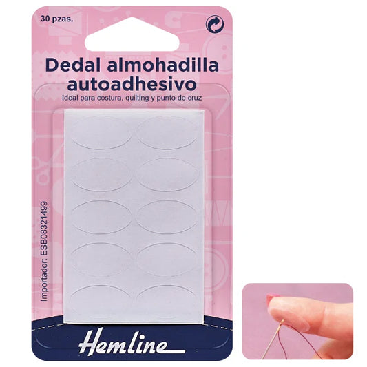 Dedal almohadilla autoadhesivo Hemline con 30 unidades ovaladas blancas para proteger la yema del dedo en costura, quilting y punto de cruz.
