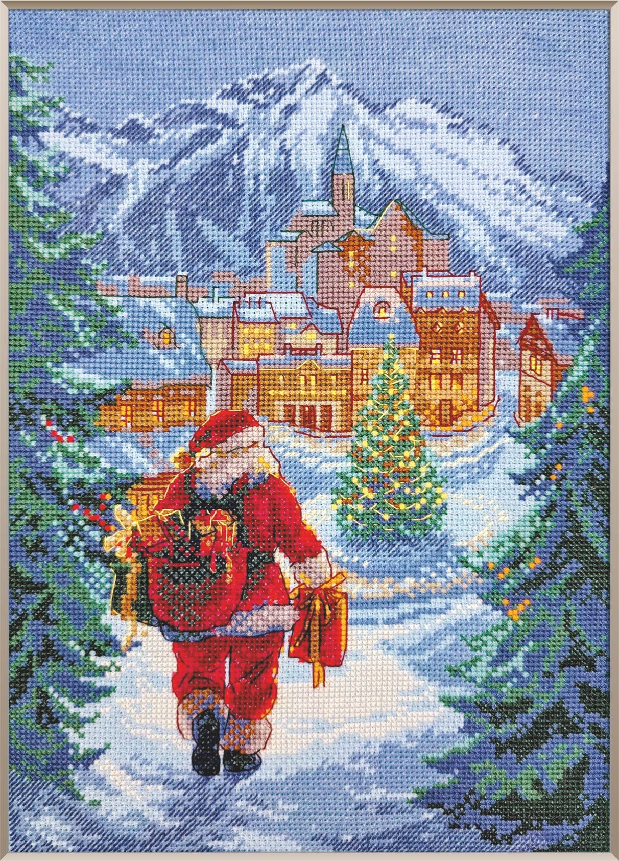 Kit de punto de cruz AINE Noche Mágica con Papá Noel caminando hacia un pueblo nevado en tela Aida azul.