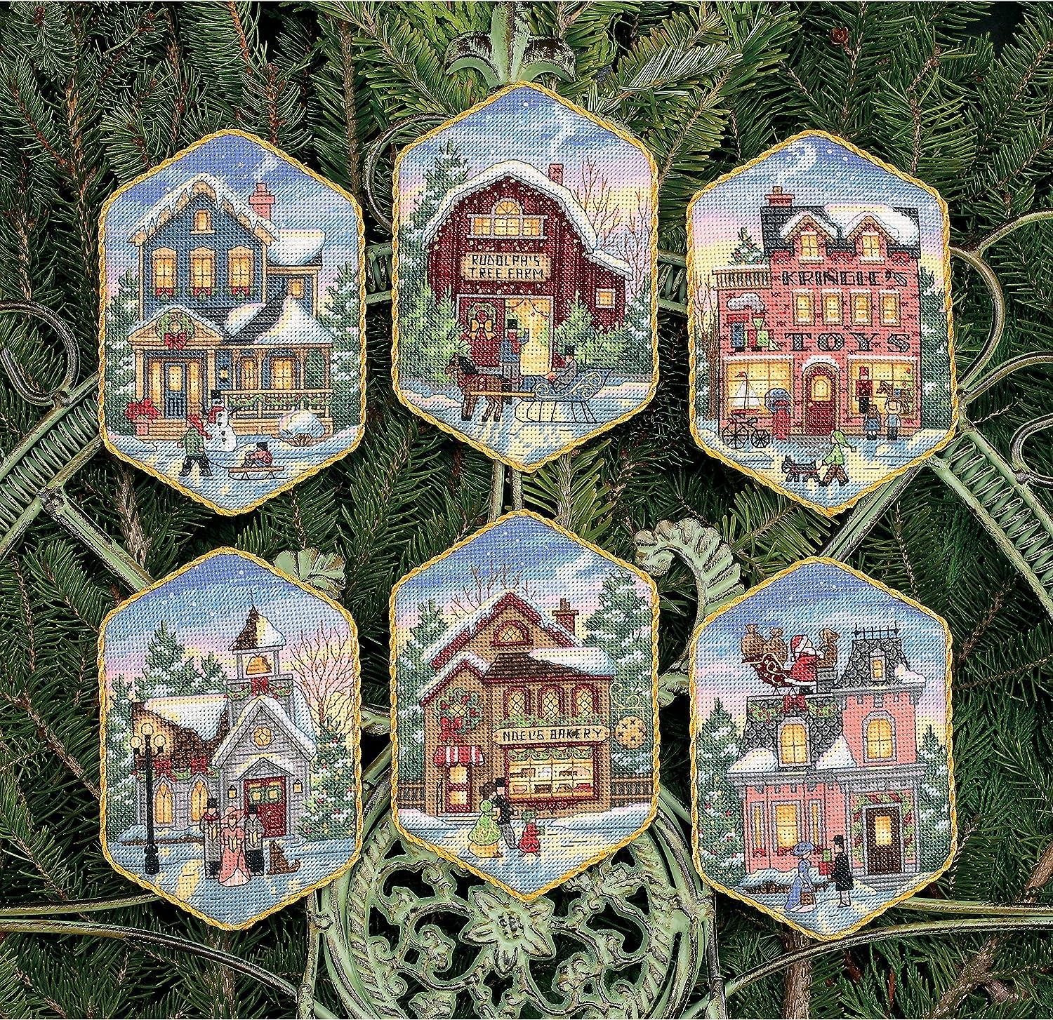 Kit para crear adornos de navidad en punto de cruz de Dimensions con diseño de poblado navideño