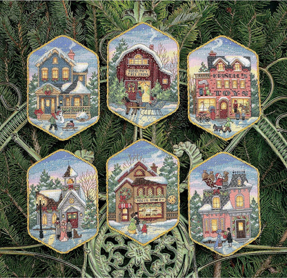 Kit para crear adornos de navidad en punto de cruz de Dimensions con diseño de poblado navideño