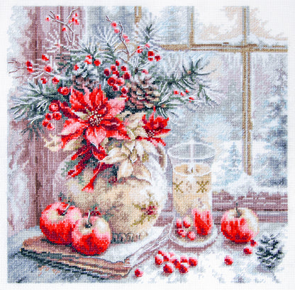 Kit de Punto de Cruz Magic Needle “A Candle Was Burning” 70-50 con diseño navideño de vela, flores y manzanas sobre una mesa junto a una ventana.