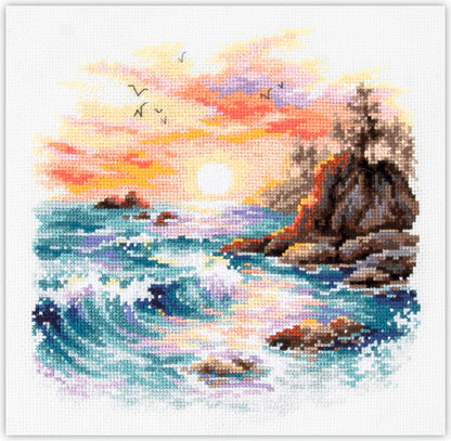 Kit de punto de cruz Magic Needle “Cuatro Elementos” con diseño de atardecer en la costa, olas rompiendo y rocas. Incluye tela Aida, hilos y aguja.