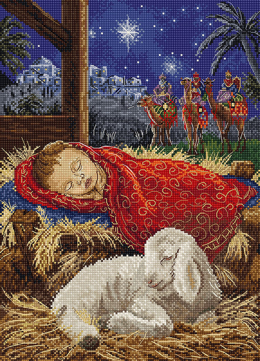 Kit de punto de cruz Letistitch “Niño Jesús” con Niño Jesús dormido en el pesebre, cordero y Reyes Magos al fondo. Incluye tela Aida, hilos y aguja.