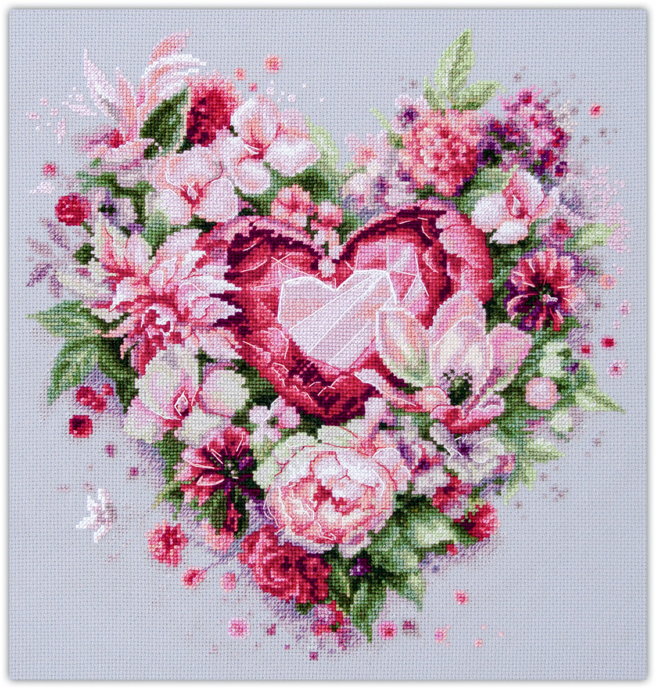 Kit de punto de cruz Magic Needle Corazón Floral con diseño romántico de flores en tonos rosados formando un corazón.