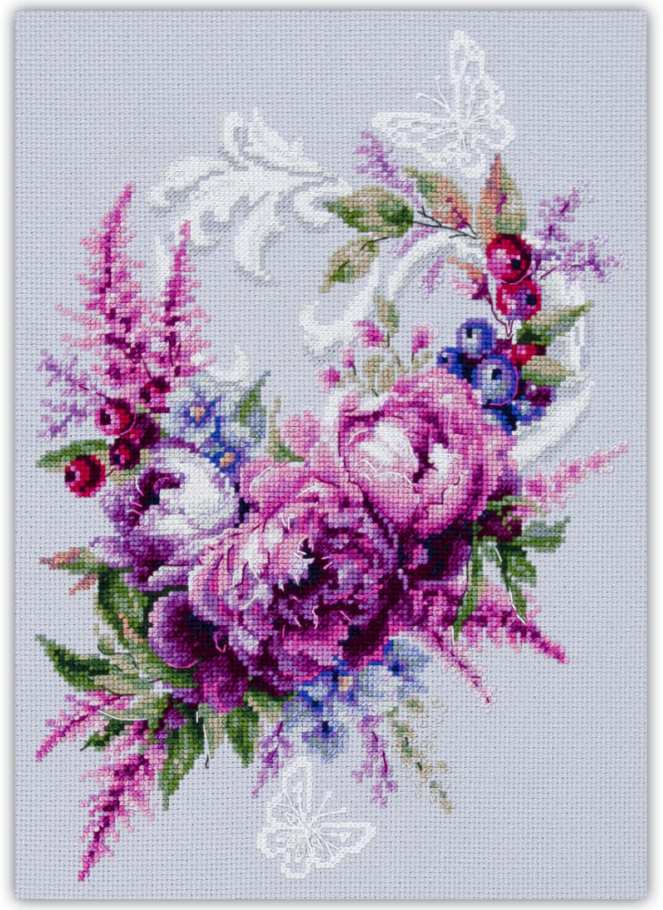 Kit de punto de cruz Magic Needle “Purple Silk Peonies” con diseño floral de amapolas moradas y rosadas. Incluye tela Aida, hilos y aguja.
