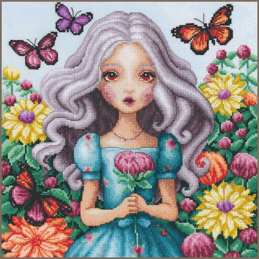 Bordado en punto de cruz de una niña rodeada de coloridas flores y mariposas