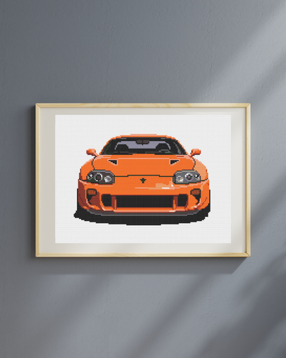 Patrón de punto de cruz del frontal de un Toyota Supra MK4 de los 90 de color naranja estilo Fast & Furious