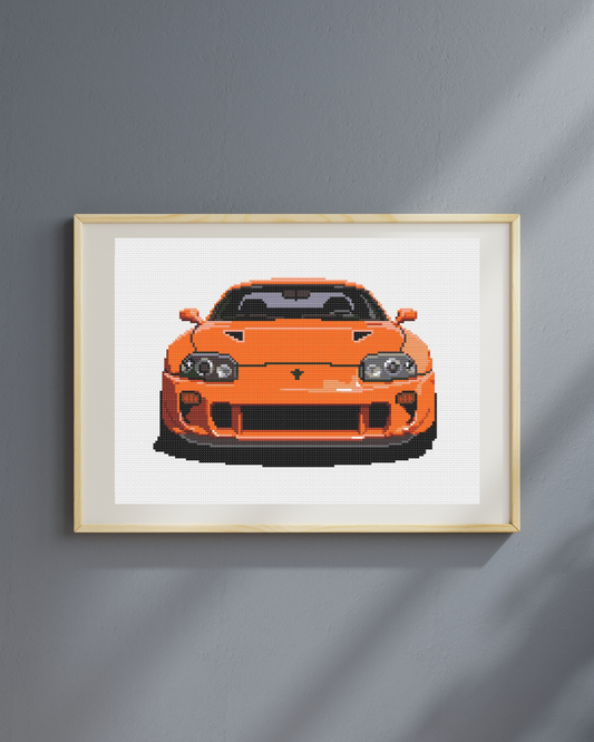 Patrón de punto de cruz del frontal de un Toyota Supra MK4 de los 90 de color naranja estilo Fast & Furious