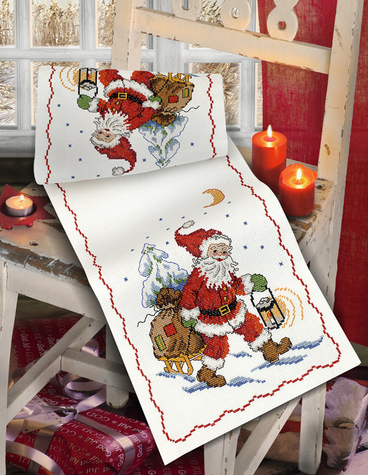 Kit de Punto de Cruz de Navidad de Camino de Mesa / Mantel Navideño de Santa llevando los regalos de Anchor
