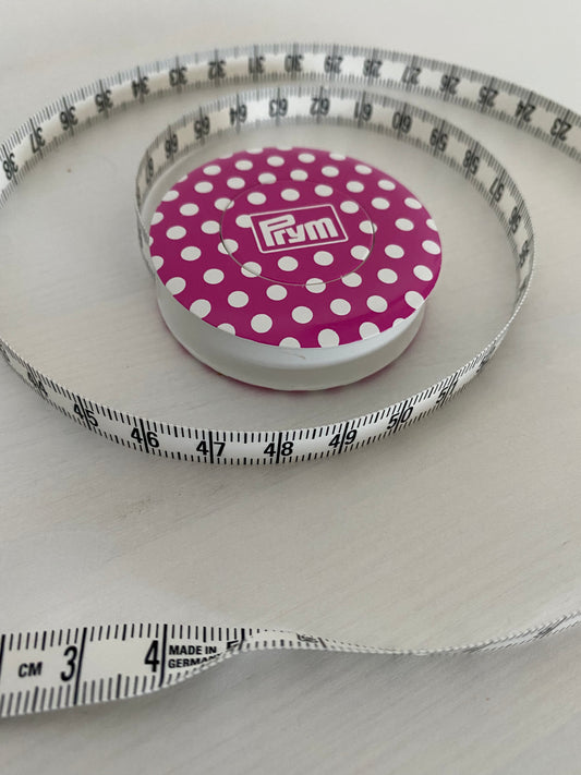cinta métrica automática PRYM lunares rosa y blanco